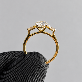 1.70 CT Oval Lab-Grown Diamond Ring with Pear Side Stones