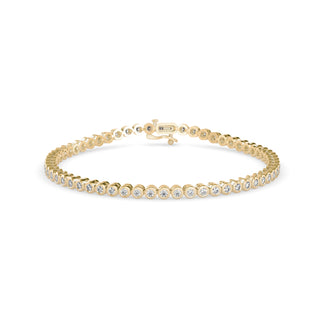 Bezel set diamond tennis bracelet with 1.38 ct round diamonds in 10.11 gm of 18kt gold. Beautiful lab grown diamond jewellery, perfect for ethical shoppers.